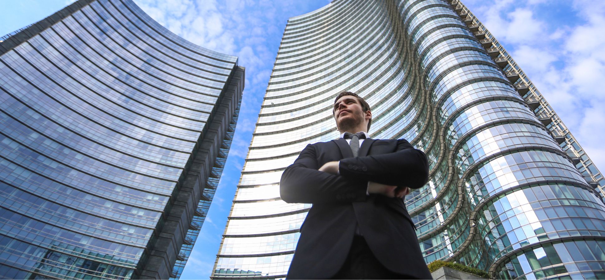 An entrepreneur standing in the front of a building