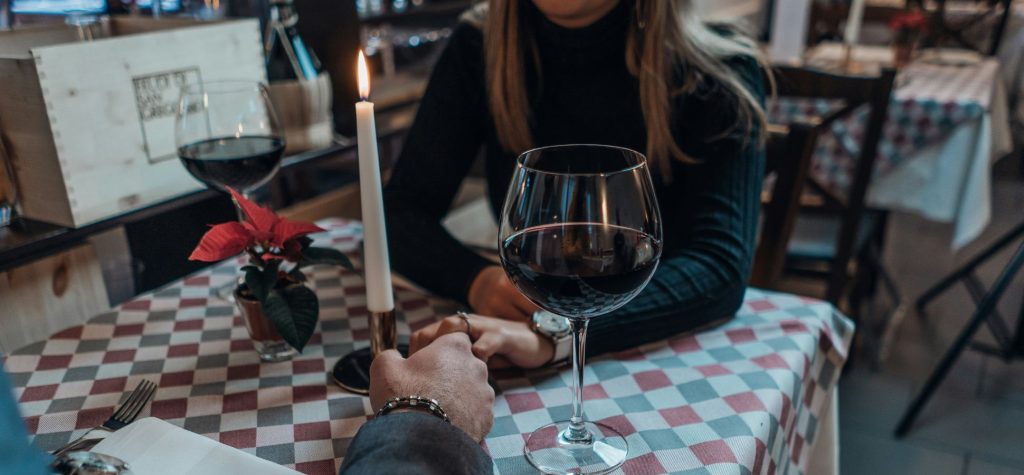 A man holding hands with a woman