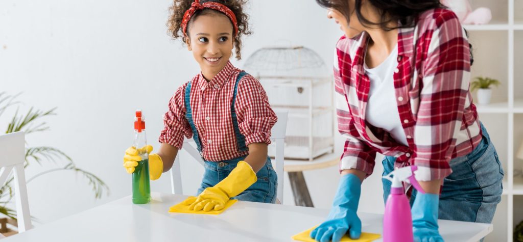 Mom cleaning with kids