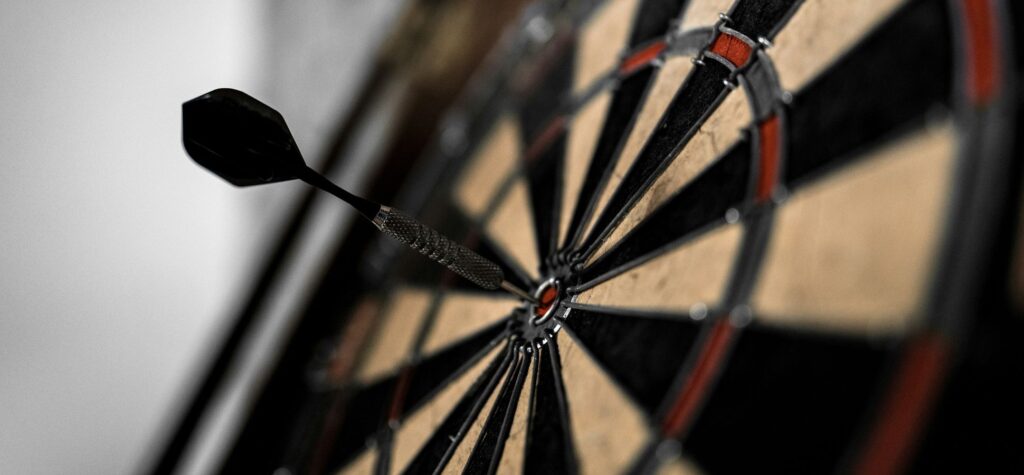 Dart on bullseye target