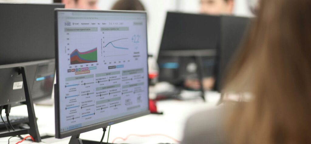 Person working on data dashboard computer