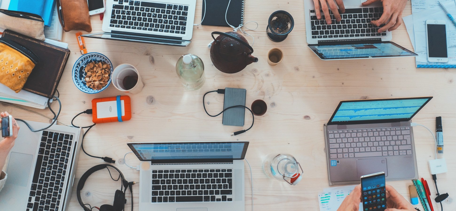 Entrepreneur working at laptop starting a new business after tech layoff