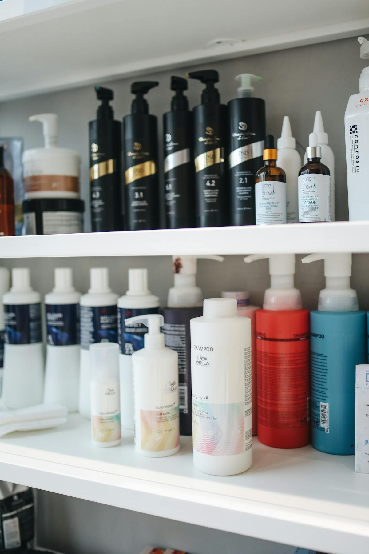Clean beauty products displayed on minimalist shelf with natural lighting