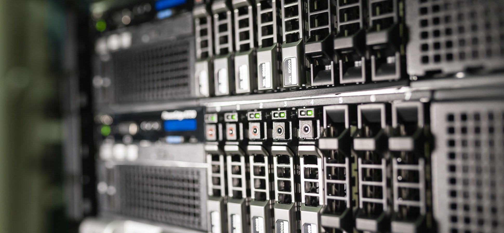 Close-up of illuminated server hardware in a data center rack