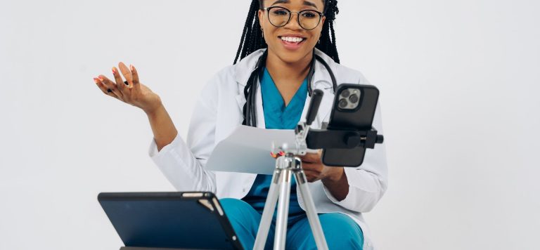 Clinician on a telehealth video consultation, the care model behind celebrities investing in health startups